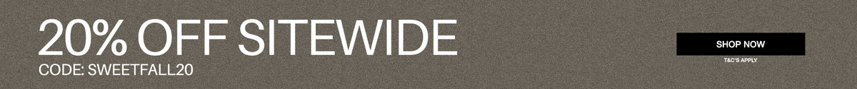 A promotional banner with a dark gray textured background featuring the text '20% OFF SITEWIDE' in large white letters, 'CODE: SWEETFALL20' below it, and a black 'SHOP NOW' button on the right.